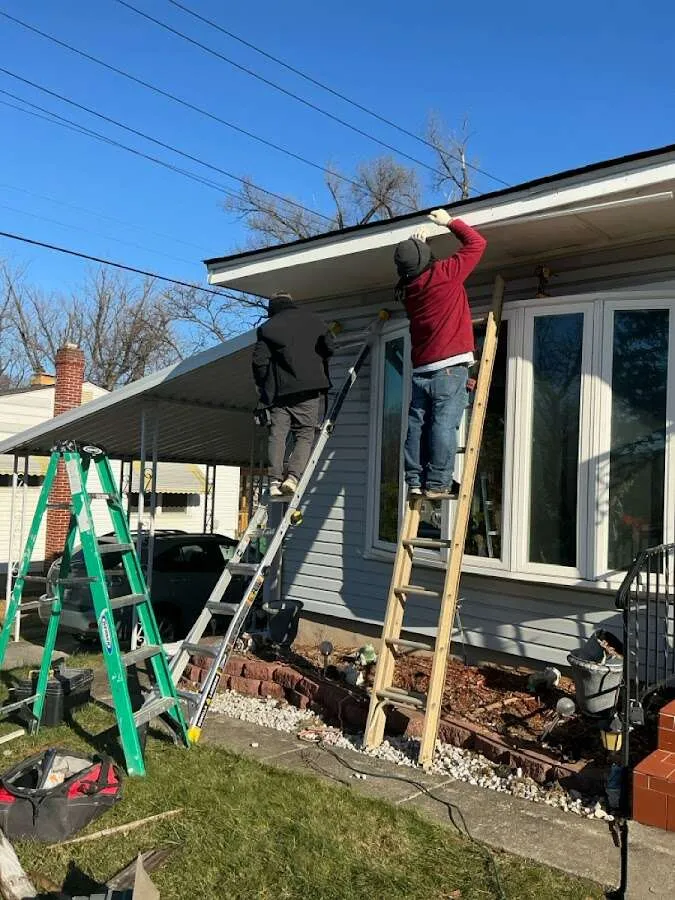 Restoration crew performing exterior repair in Summit